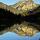 Photographie du Roc d'Enfer et de son reflet dans les eaux du lac de Vallon