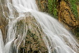 Photo d'un rocher arros par l'eau de la cascade de Glandieu