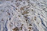 Photo de l'cume des vagues de l'ocan atlantique sur une plage de Bretagne