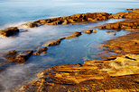 Image of rock pools on the Mediterranean coast at Bau Rouge beach in Carqueiranne