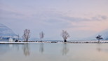Image des bords du lac d'Annecy par un crpuscule d'hiver